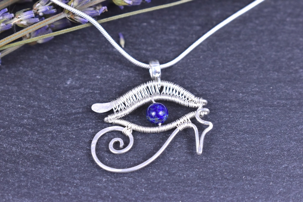 Pendentif Oeil d'Horus, tissé en argent massif