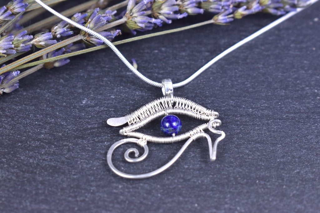 Pendentif Oeil d'Horus, tissé en argent massif