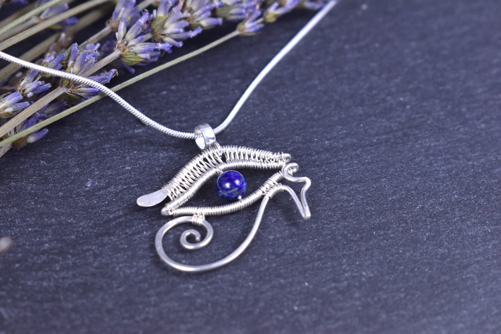 Pendentif Oeil d'Horus, tissé en argent massif