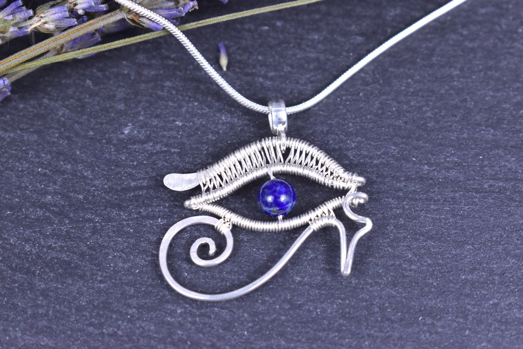 Pendentif Oeil d'Horus, tissé en argent massif