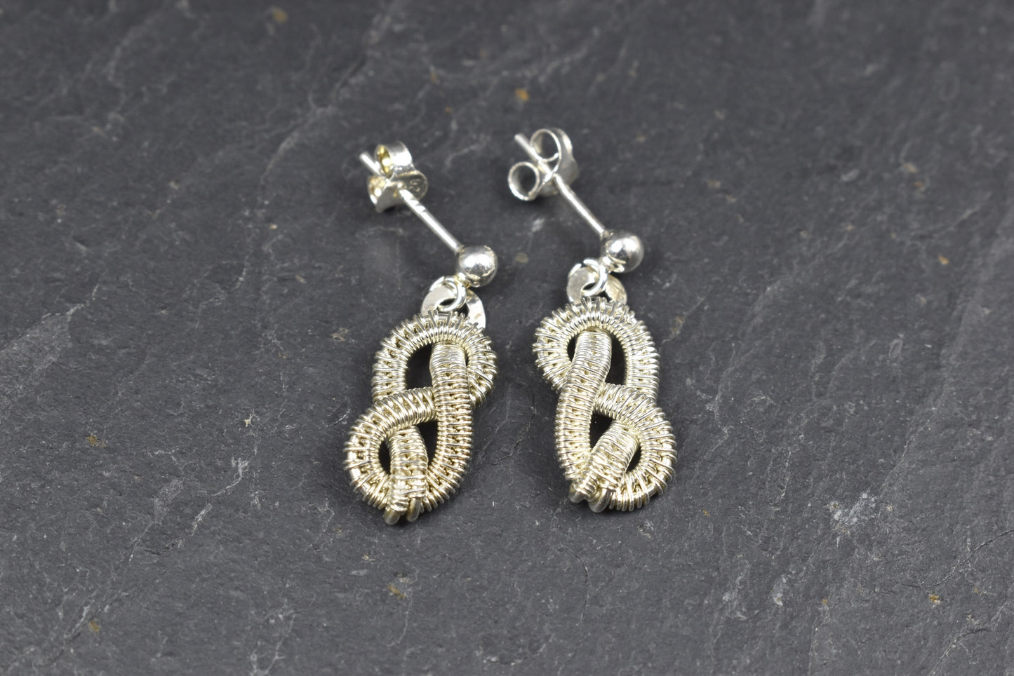 Boucles d’oreilles "Neve" en Argent massif tissé.