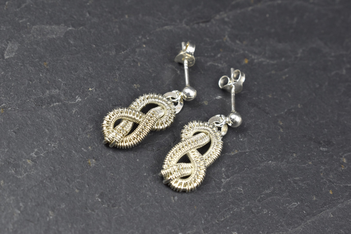 Boucles d’oreilles "Neve" en Argent massif tissé.