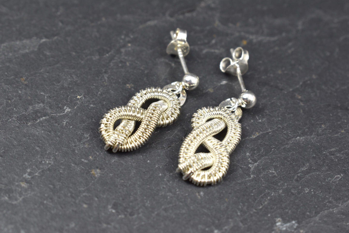 Boucles d’oreilles "Neve" en Argent massif tissé.