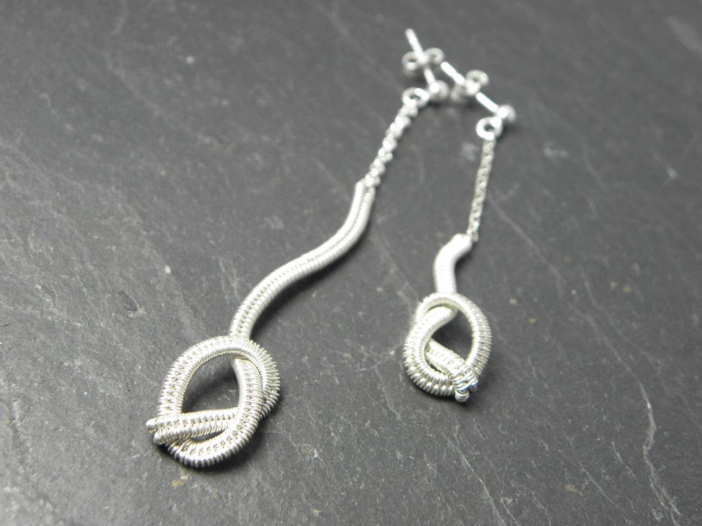 Boucles d’oreilles Nezig en Argent massif tissé.