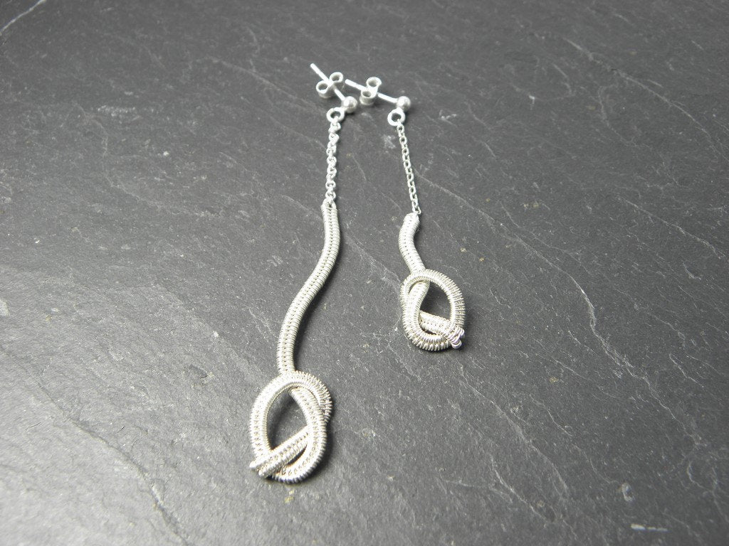 Boucles d’oreilles Nezig en Argent massif tissé.