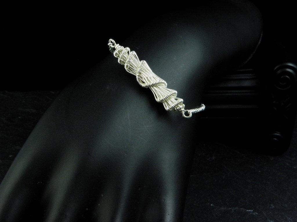 Criosa, Bracelet cocon en tissage d'argent massif